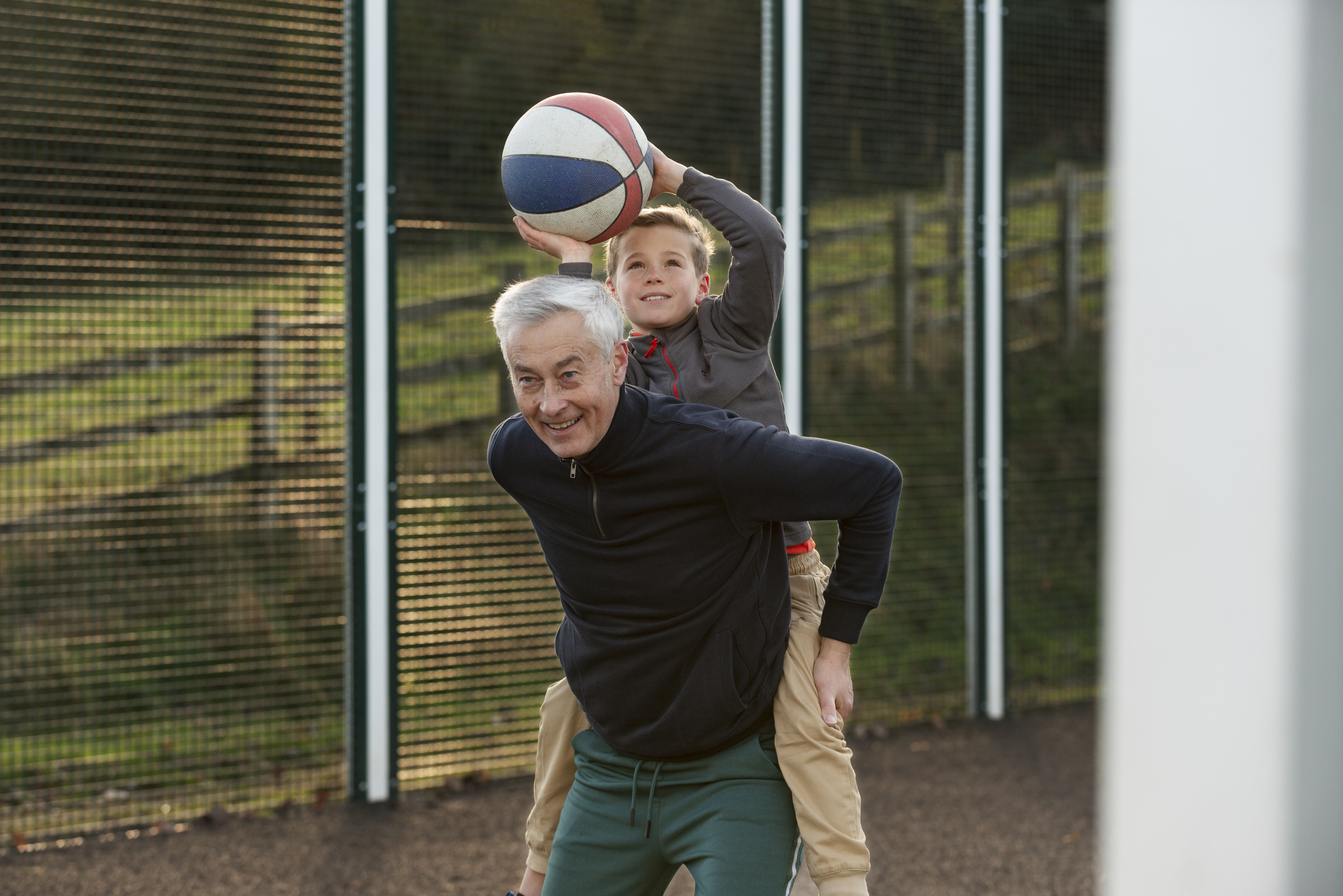 medium-shot-man-carrying-grandchild